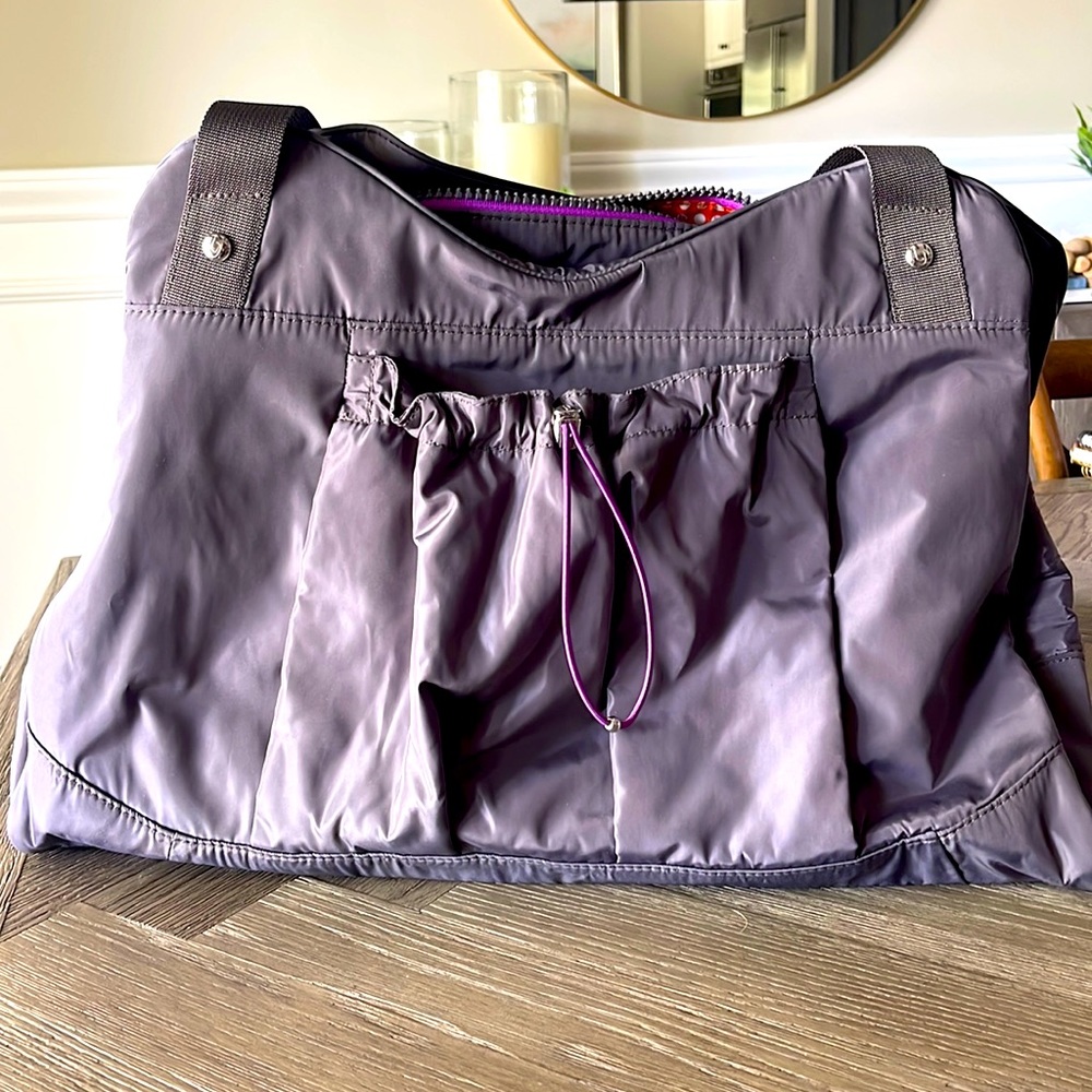 Versatile gray Baggallini Yoga Tote is NWT, never been carried.